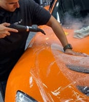 Orange car wash cleaning