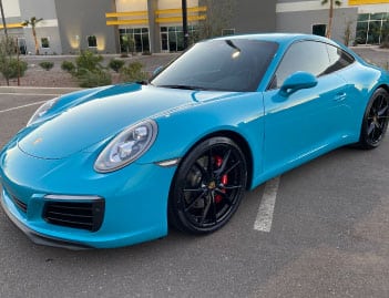 Light Blue Luxury Car With Car Paint Protection Against Environmental Damage