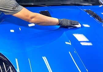 Hard Water Stain Removal And Ceramic Coating On Electric Blue Jaguar Model