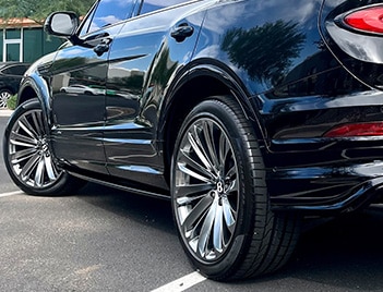 Black Bentley Bentayga With Powder Coating On Wheel Rims