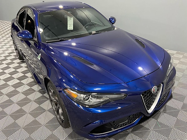 Blue Alfa Romeo Giulia At Our Professional Auto Detailing Facility in Mesa, AZ