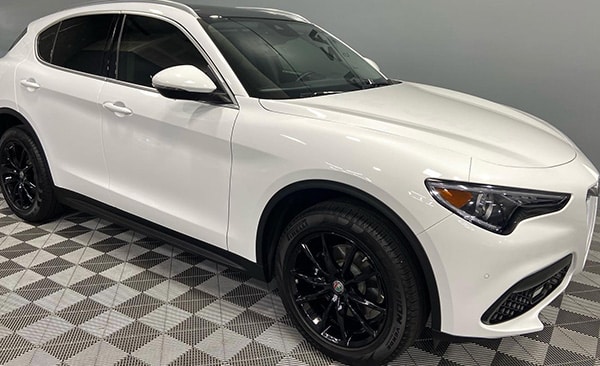 White Luxury Alfa Romeo Stelvio SUV with Ceramic Coating By Licensed Specialists