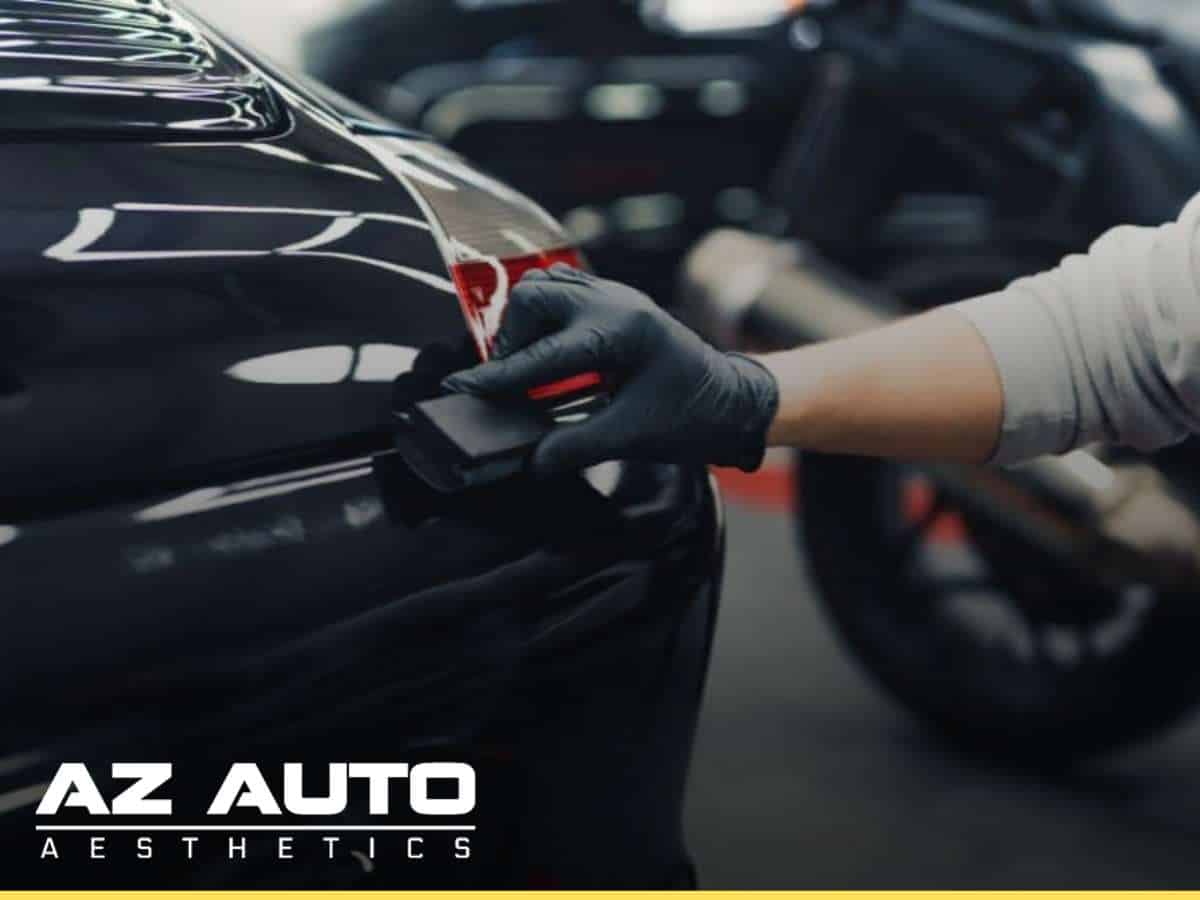 Applying Ceramic Coating to a car to protect its exterior from damage
