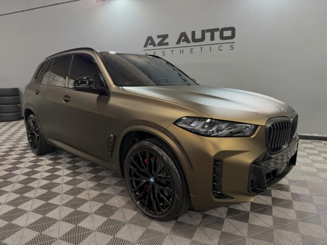 ⚜️Shadow Gold Done Right⚜️

This 2026 BMW X5 xDrive40i came in white and left in Shadow Gold (Satin Bronze) thanks to a full-body transformation using @pureppf. The finish hits that perfect balance — modern, muted, and aggressive without being loud.

We paired the satin bronze with a full set of gloss black details:
• Roof
• Door handles
• Hatch spoiler
• Rear diffuser

To finish it off, the entire vehicle was sealed with a matte ceramic top-coat, and we added our 7-Window + Windshield ceramic tint package using @xpel XR Prime, dialing in heat rejection, privacy, and a cleaner overall profile.

One of the sharpest X5 builds we’ve put out.
Looking to give your vehicle a Full-Body transformation?

📞📲 Call or DM us today to get a quote!📞📲

Az Auto Aesthetics
7613 E Ray Rd #114, Mesa, AZ 85212
Open: M–F 8:30–6 PM | Sat 9–2 PM
https://wedetailaz.com
📞 (480) 241-9324

#bmw #bmwx5 #pureppf #paintprotectıonfılm #fullbodyppf #xpel